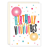 The Vibes Birthday Card by Andrea Williams features “Birthday Vibes” in bold, playful letters, confetti dots, yellow and pink bursts, and colorful inside detailing—perfect for a fun celebration.