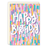 The Colorful Confetti Birthday Card by Natalie Henry Charles features HAPPY BIRTHDAY in bold white letters surrounded by vibrant pastel brush strokes, and is crafted from recycled paper to spread extra love and joy.