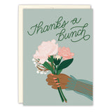 The 30-ish Birthday Card by Tiffany Grimes features a hand holding a bouquet of pink flowers on a light green background, with an envelope included.