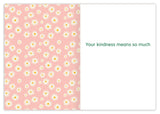 The Thanks A Bunch Thank You Card by Tiffany Grimes features a pink background with white daisies on the left and Your kindness means so much in green text on a white panel to the right.
