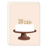 The Tiffany Grimes 30-ish Birthday Card features a white cake on a brown stand with colorful accents and 30 ISH candles on a light beige background—an illustrated, charming choice for birthday celebrations.