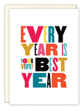 The Every Year Birthday Card by Andrea Williams features bold, colorful text—EVERY YEAR IS YOUR VERY BEST YEAR—on white, a cream inner layer, and is printed on recycled paper.