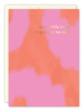 The Every Little Thing Support Card by Lauren-Ashley Barnes features a pink and orange abstract design with gold text, every little thing is going to be okay. Made from high-quality recycled cardstock, it includes an off-white envelope behind the card.