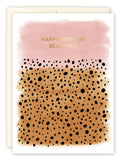 The Cheetah Print Birthday Card by Lauren-Ashley Barnes features a pink and brown watercolor background with black spots and gold Happy Birthday Beautiful text. Printed in the USA.
