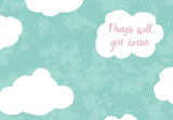 The No Storm, No Rainbow Encouragement Card by Lauren-Ashley Barnes features white clouds on a blue-green background, with handwritten pink text: Things will get better. Printed on recycled paper—perfect for sending encouragement.