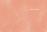 The Here For You Sympathy Card by Lauren-Ashley Barnes features a soft peach background with Im here for you when you need me in small white letters in the upper right, designed as a high-quality illustrated card on recycled paper.