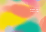 Pastel background with blended yellow, pink, green, and blue. White text on the right reads “Dots Happy Birthday Card.” Illustrated by Lauren-Ashley Barnes. Perfect as a birthday greeting card.