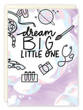 The Dream Big New Baby Card by Natalie Henry Charles features pastel swirls and icons like a film reel, planet, paintbrush, and more. Printed on recycled paper, it reads: dream BIG LITTLE ONE.