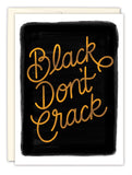The Black Don’t Crack Birthday Card by Tiffany Grimes features bold golden-yellow cursive on a black background, white edges, a cream recycled paper envelope, and eco-friendly materials.