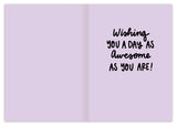 The Colorful Confetti Birthday Card by Natalie Henry Charles features an open design with a light purple background. The right side says, Wishing you a day as awesome as you are! while the left side remains blank for your message.